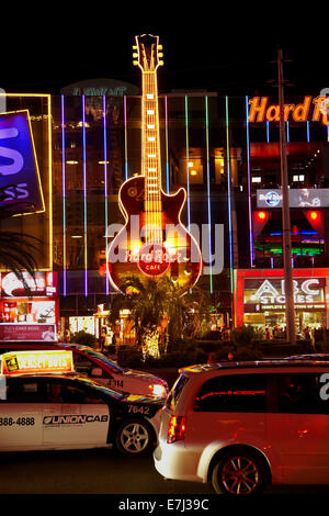 The Hard Rock Cafe and traffic along The Strip at night, Las Vegas, Nevada, USA Stock Photo