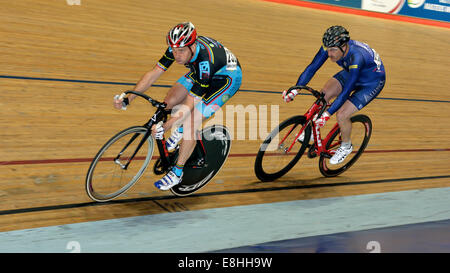 Velodrome Manchester, UK  08th October 2014 Competitors in action  during the 2014 UCI Track Cycling World Masters Championships. World Masters Cycling Championships  Manchester, UK Stock Photo