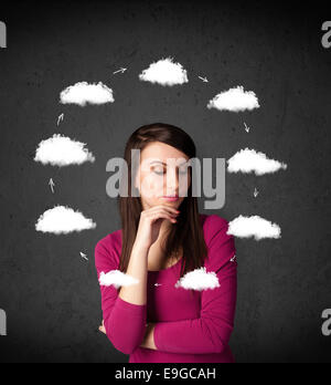 Young woman thinking with cloud circulation around her head Stock Photo