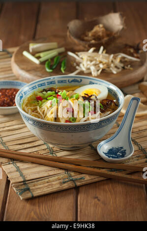 Soto ayam. Chicken and noodle soup. Indonesia Food Stock Photo