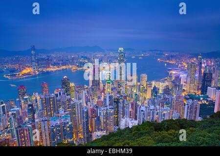 Hong Kong. Image of Hong Kong with many skyscrapers during twilight blue hour. Stock Photo