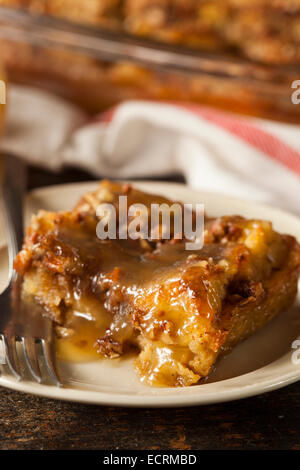 Sweet Homemade Bread Pudding Dessert with Brandy Sauce Stock Photo