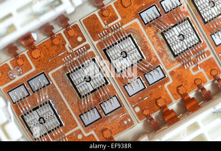 A so-called IGBT module (insulated-gate bipolar transistor) of semiconductor manufacturer Infineon is on display at the company's headquarter in Neubiberg, Germany, 28 January 2015. IGBT module are used for controlling electric motor in industrial applications. Photo:  Andreas Gebert/dpa Stock Photo