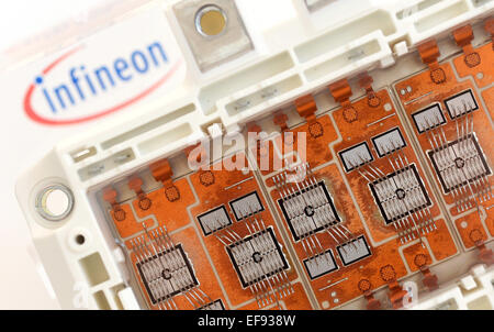 A so-called IGBT module (insulated-gate bipolar transistor) of semiconductor manufacturer Infineon is on display at the company's headquarter in Neubiberg, Germany, 28 January 2015. IGBT module are used for controlling electric motor in industrial applications. Photo:  Andreas Gebert/dpa Stock Photo