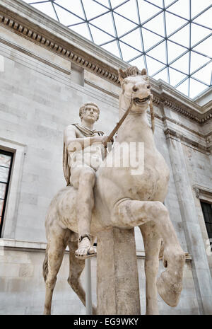 In the British Museum, London, UK. A 1st century Roman statue of a young man on horseback, in the Queen Elizabeth II Great Court Stock Photo