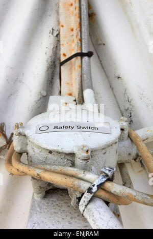 Safety Switch sticker on an old electric box Stock Photo