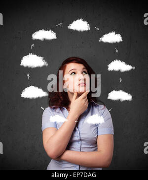 Young woman thinking with cloud circulation around her head Stock Photo