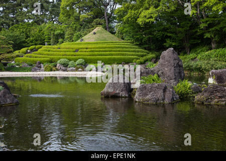 Momijiyama Garden is located near the ruins of Sunpu Castle in Shizuoka.  Garden of the Village is made up of various flowers, p Stock Photo