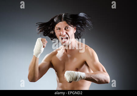 Ripped martial arts expert at training Stock Photo