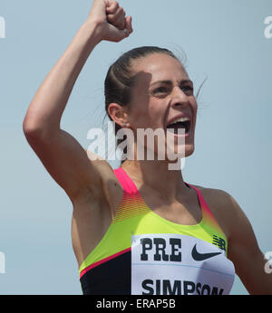 Eugene, USA. 30th May, 2015. Jennifer Simpson of the United States reacts after crossing the finishing line during the women's 1500m event at the 2015 IAAF Diamond League in Eugene, the United States, on May 30, 2015. Jennifer Simpson claimed the champion with 4:00:98. © Yang Lei/Xinhua/Alamy Live News Stock Photo