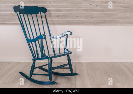 Blue rocking chair in a living room Stock Photo