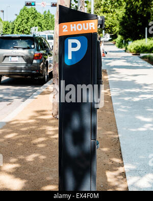 An electronic automated parking meter station in downtown Oklahoma City, Oklahoma, USA. Side view. Stock Photo