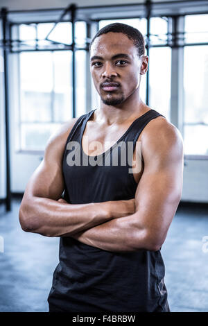 Fit man with arms crossed Stock Photo