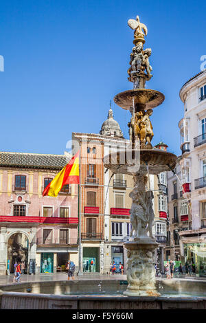 Genoa Fountain on Plaza de la Constitucion in the historic center of Malaga, Andalusia, Spain Stock Photo