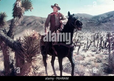 1953, Film Title: LAW AND ORDER, Director: NATHAN JURAN, Studio: UNIV, Pictured: HORSE, COWBOY HAT, RONALD REAGAN, RIDING, WESTERN, SHERIFF, COWBOY, DESERT. (Credit Image: SNAP) Stock Photo