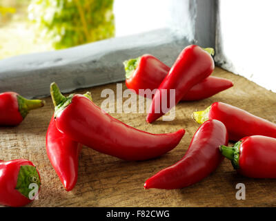 Fresh red chilli peppers whole Stock Photo