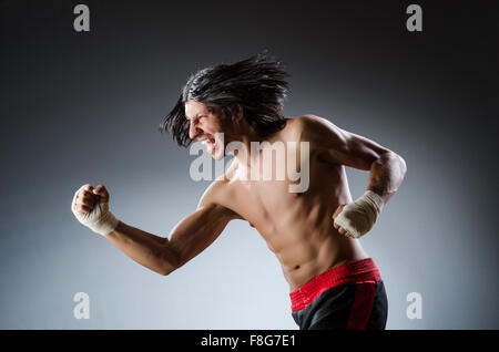 Ripped martial arts expert at training Stock Photo