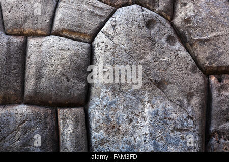 polygonal stone in an old masonry of the Incas Stock Photo