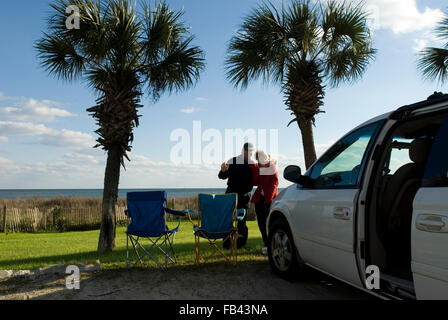 Caucasian couple waving Myrtle Beach SC USA Stock Photo