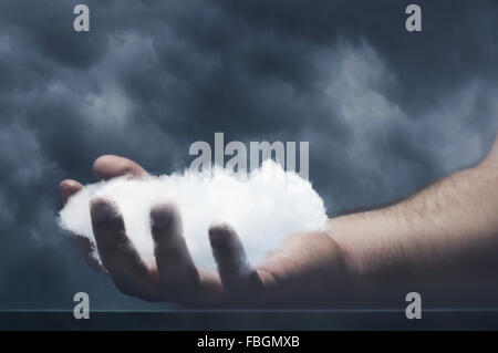 Human hand with cloud Stock Photo