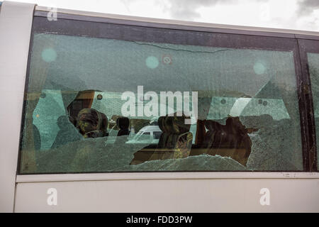 Kent, UK. 30th January, 2016. Smashed coach window after far-right protest. Far-Right nationalist groups violently clash with London anti-fascists at a Maidstone service station where coaches were also vandalised Credit:  Guy Corbishley/Alamy Live News Stock Photo