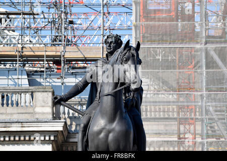 London, England, UK. Trafalgar Square - scaffolding on the National Gallery behind the statue of George IV Stock Photo