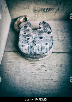 Old decayed padlock Stock Photo