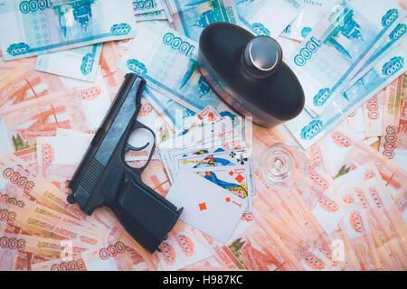 The gun and playing cards Russian big money Stock Photo