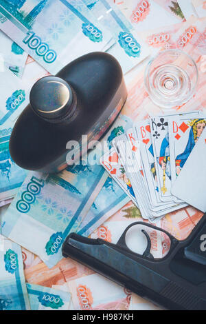 The gun and playing cards Russian big money Stock Photo