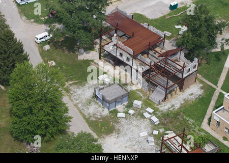 An aerial view of Muscatatuck Urban Training Center during Vibrant Response 14. Vibrant Response 14 is a major field training exercise conducted by U.S. Northern Command and led by U.S. Army North. U.S. Army North conducts Vibrant Response 14 to confirm the operational readiness and tactical capabilities of major elements of the Department of Defense's specialized forces designed to respond to chemical, biological, radiological and nuclear (CBRN) incidents in support of local, state and federal civilian agencies. A unique training center for a critical mission 140806-A-XQ291-003 Stock Photo