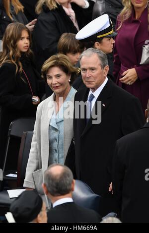 Former President George W. Bush and wife Laura Bush arrive for the President Inaugural Ceremony on Capitol Hill January 20, 2017 in Washington, DC. Donald Trump became the 45th President of the United States in the ceremony. Stock Photo