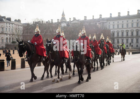 London, UK. 03rd Feb, 2017. Changing The Queen's Life Guard at Horse Guards Parade. The Queen's Life Guard is normally provided by men of the Household Cavalry Mounted Regiment which consists of a Squadron of The Life Guards, who wear red tunics and white plumed helmets, and a Squadron of The Blues and Royals with blue tunics and red plumed helmets. Credit: Alberto Pezzali/Pacific Press/Alamy Live News Stock Photo