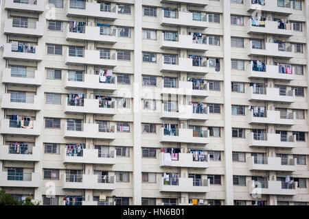 TOKYO- MAY 25: A basic, residential tower block in the Tsukiji district of Tokyo on 25th May 2012. The rows of windows and balconies face out onto the Stock Photo