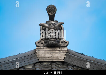 Traditional Japanese architecture and rooftop gargoyles. Stock Photo