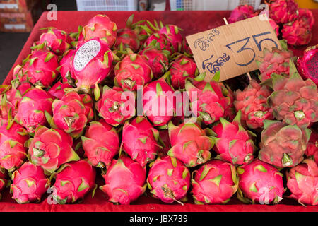 Dragon fruits at the market stall in Chiang Mai, Thailand. Stock Photo