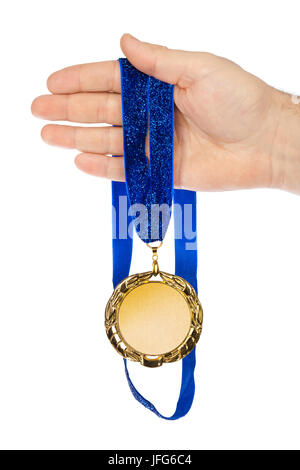 Gold medal in hand Stock Photo