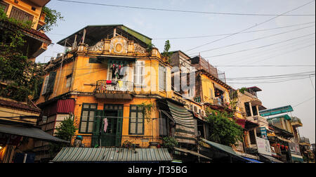 Hanoi, Vietnam - Sep 22, 2013. Ancient buildings at Old Quarter in Hanoi, Vietnam. The center of Hanoi is Hoan Kiem Lake and at the heart of Hanoi, is Stock Photo