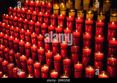 Votive candles in Catholic church in Barcelona Stock Photo