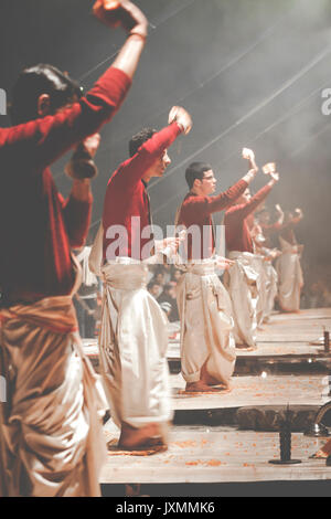 VARANASI, INDIA - JANUARY 25, 2017: Waving Kapoor lamps. Crowds watch as priests perform the Ganga Aarti ceremony at Dasaswamedh Ghat in Varanasi, Ind Stock Photo