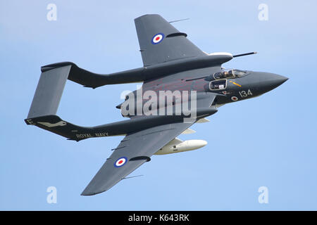 Navy Wings Sea Vixen displaying at a Duxford air show in May 2017. Aircraft was damaged upon landing back at Yeovilton. Stock Photo