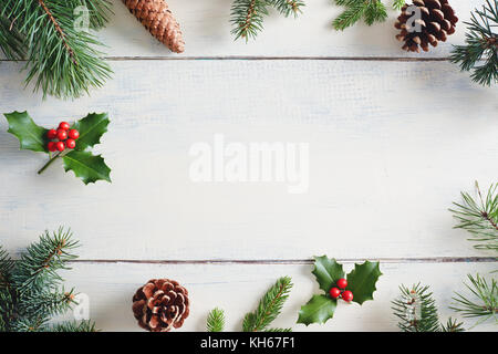 Christmas background with Christmas decorations on wooden white table. Stock Photo