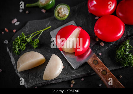 Babybel cheese in red wax Stock Photo