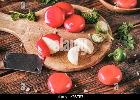 Cheese in red wax Stock Photo