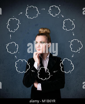 Thoughtful young woman with drawn clouds circulating around her head Stock Photo