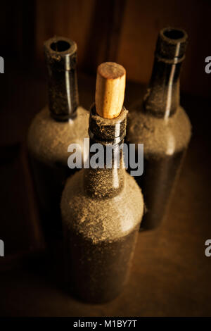 Still-life with three old wine bottles Stock Photo