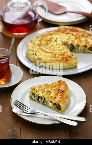 homemade rolled borek, spinach and feta cheese, turkish cuisine Stock Photo