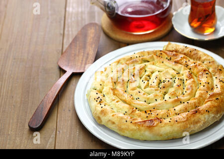 homemade rolled borek, spinach and feta cheese, turkish cuisine Stock Photo