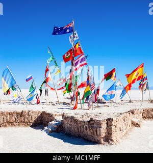 Flags at the Salar de Uyuni, Bolivia, the largest salt flat in the world Stock Photo