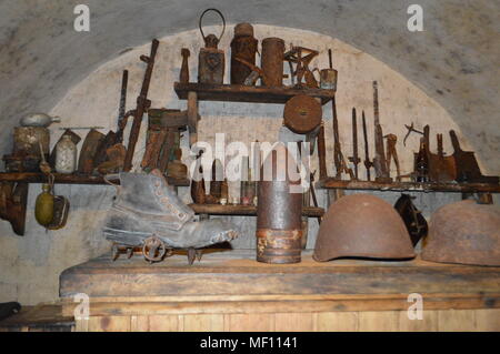 There were several old cannons up here, indicating the defensive nature of these walls. Medieval halberds as an ornament in the interior of an old cas. Stock Photo