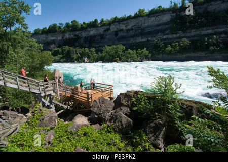 the Niagara River’s Class 6 white-water rapids as seen from the White Water Walk attraction in the Niagara Gorge at Niagara Falls, Ontario, Canada Stock Photo